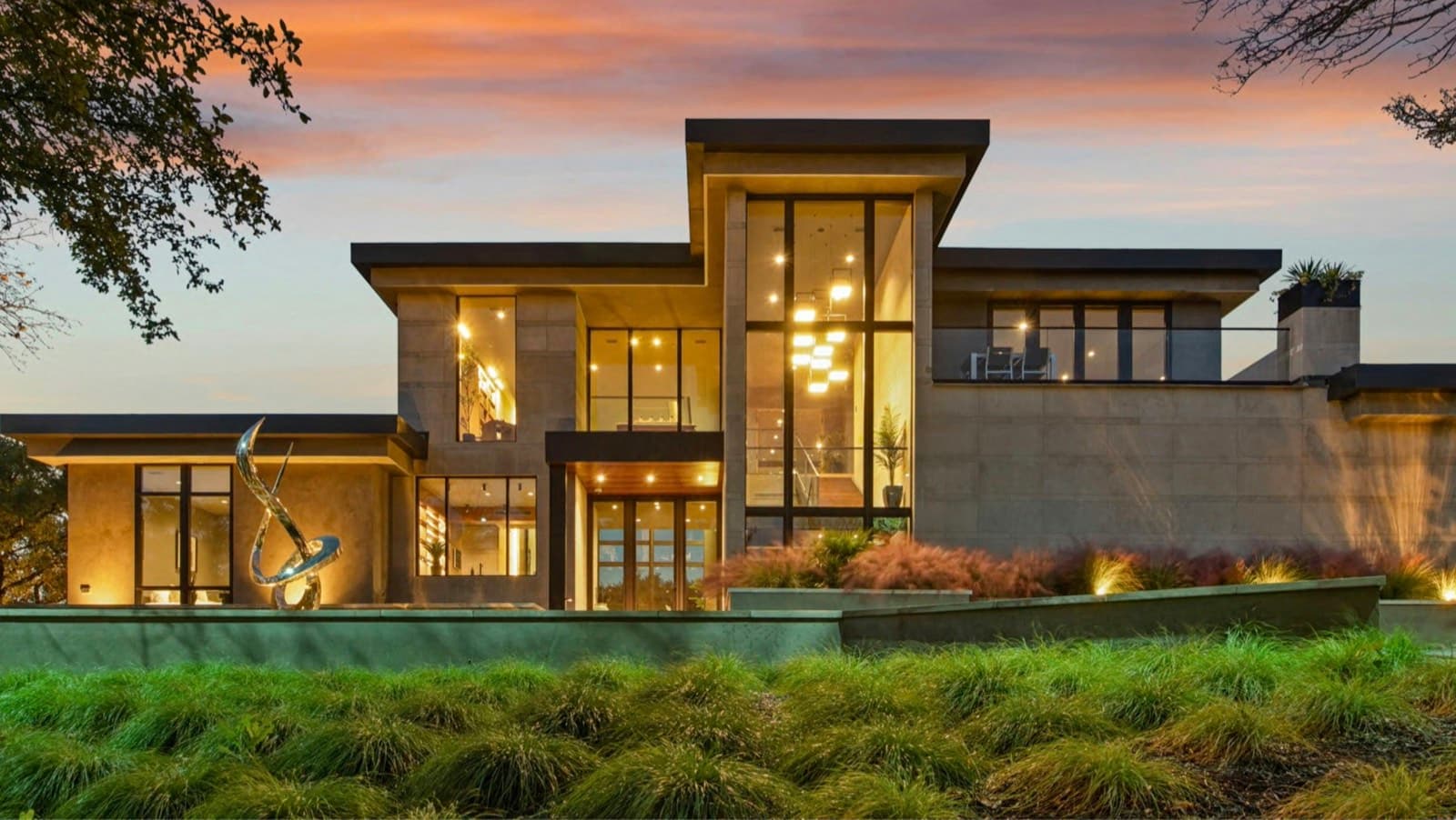 Grand private residence illuminated at dusk